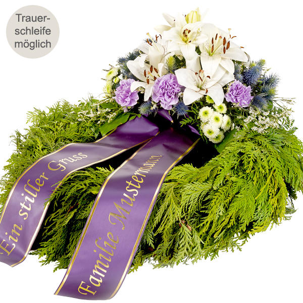 Eleganter Trauerkranz mit Blumen in Weiß und Lila